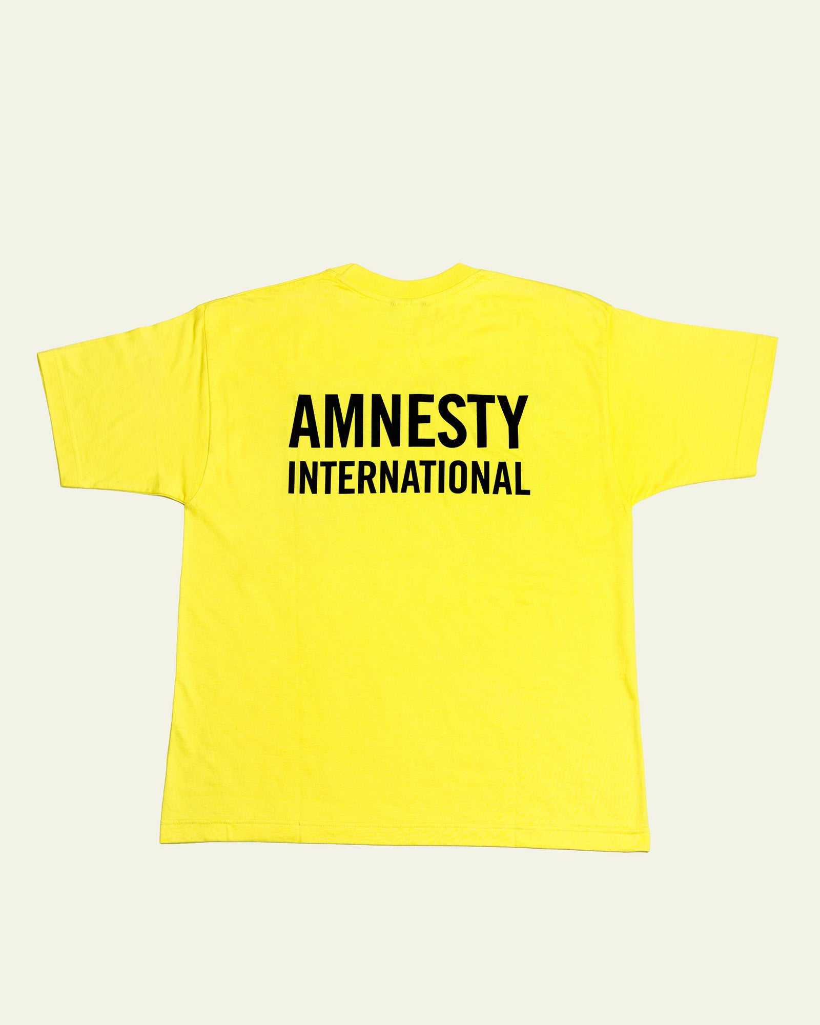 T-Shirt Amnesty Gelb